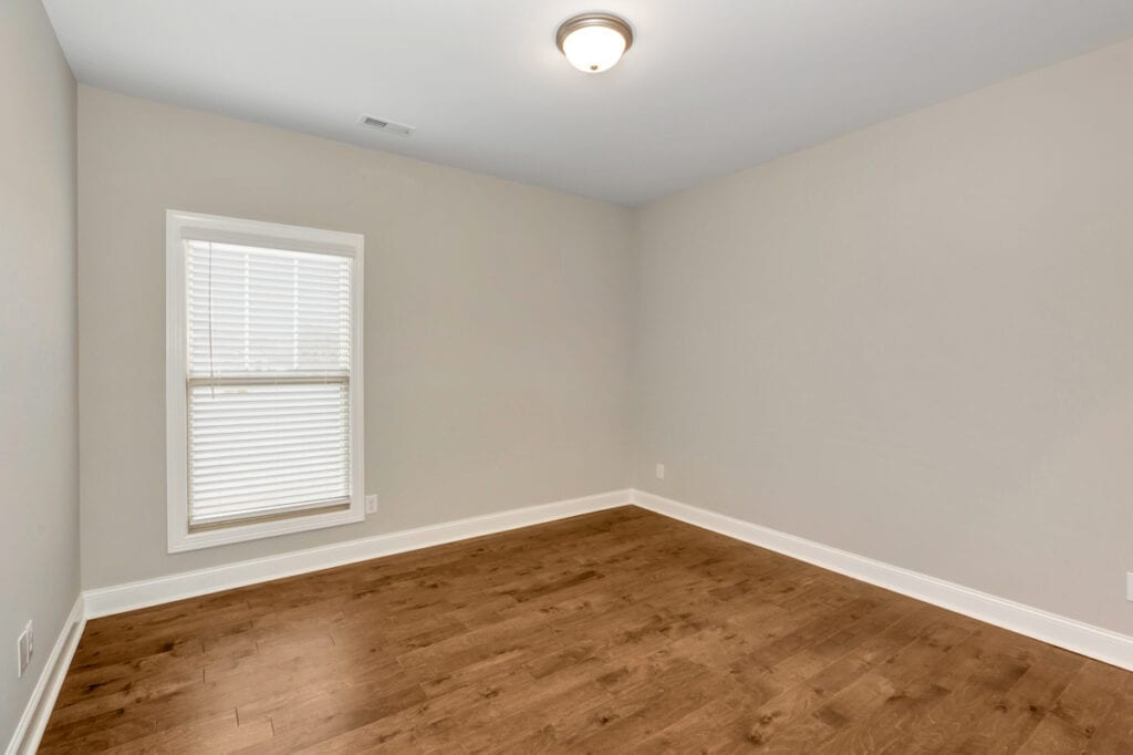 White Color Walls Room With Window and Wood Floor