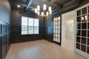 a room with black wooden walls